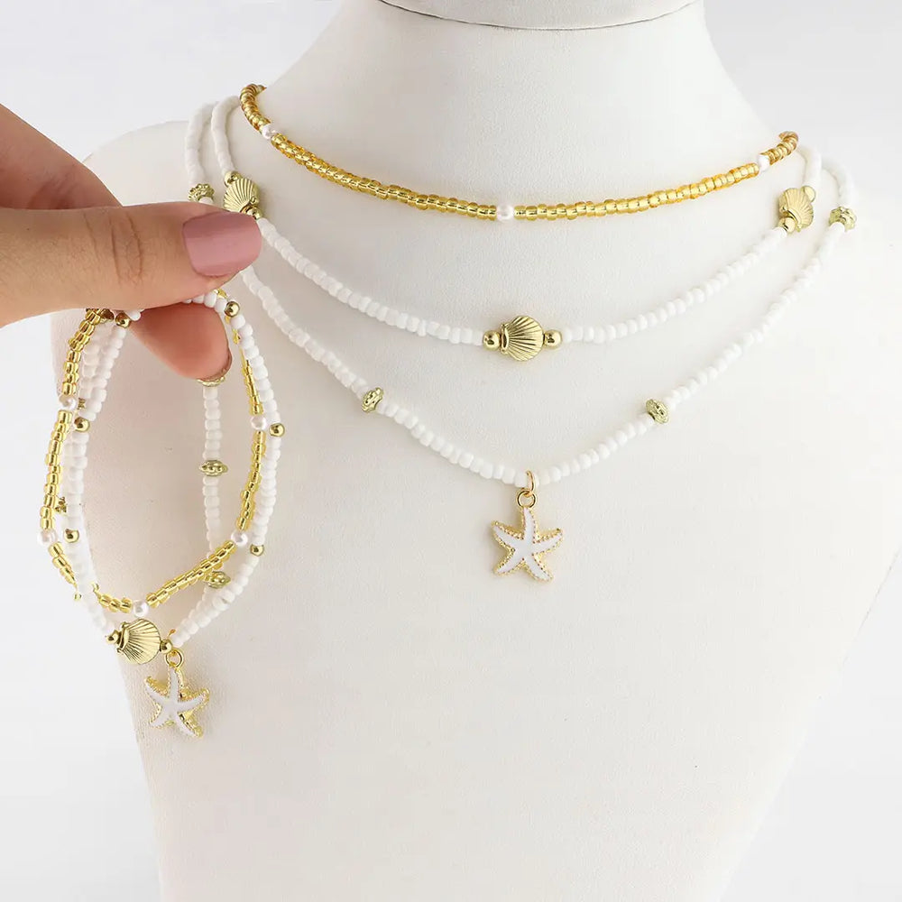 Set perla dorado bijou 3 colgantes + 3 pulseras