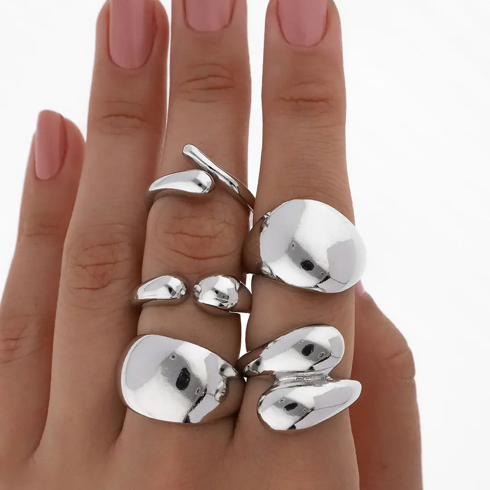 Set plateado bijou 5 anillos