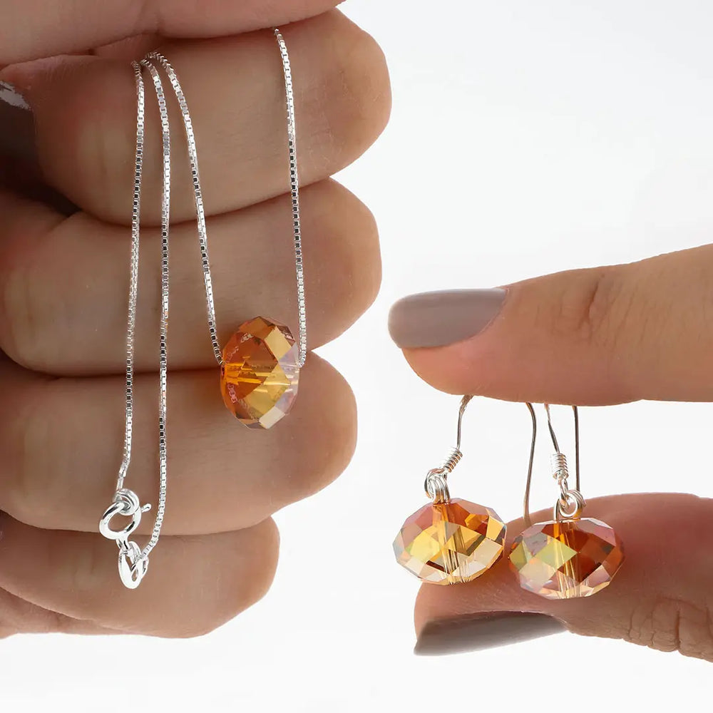 Juego de aros y colgante plating
