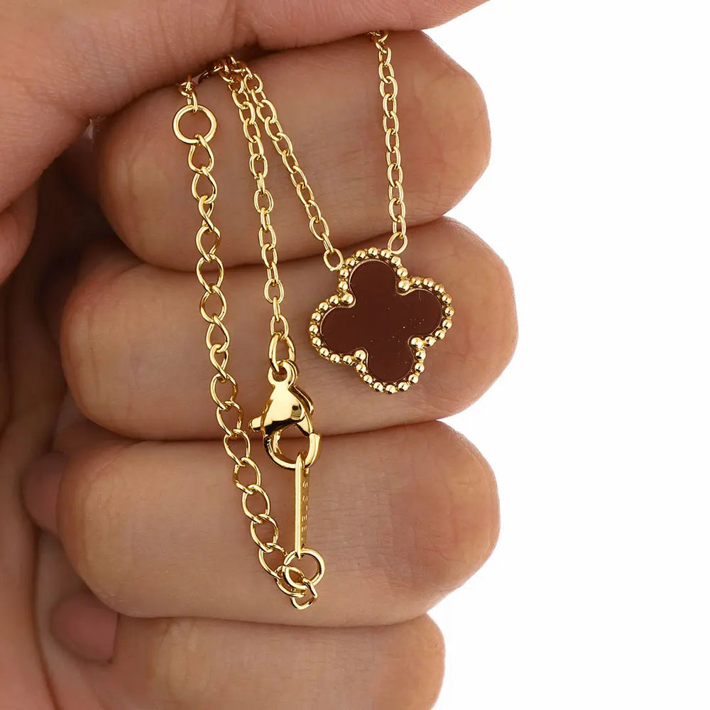 Colgante Cleff acero dorado