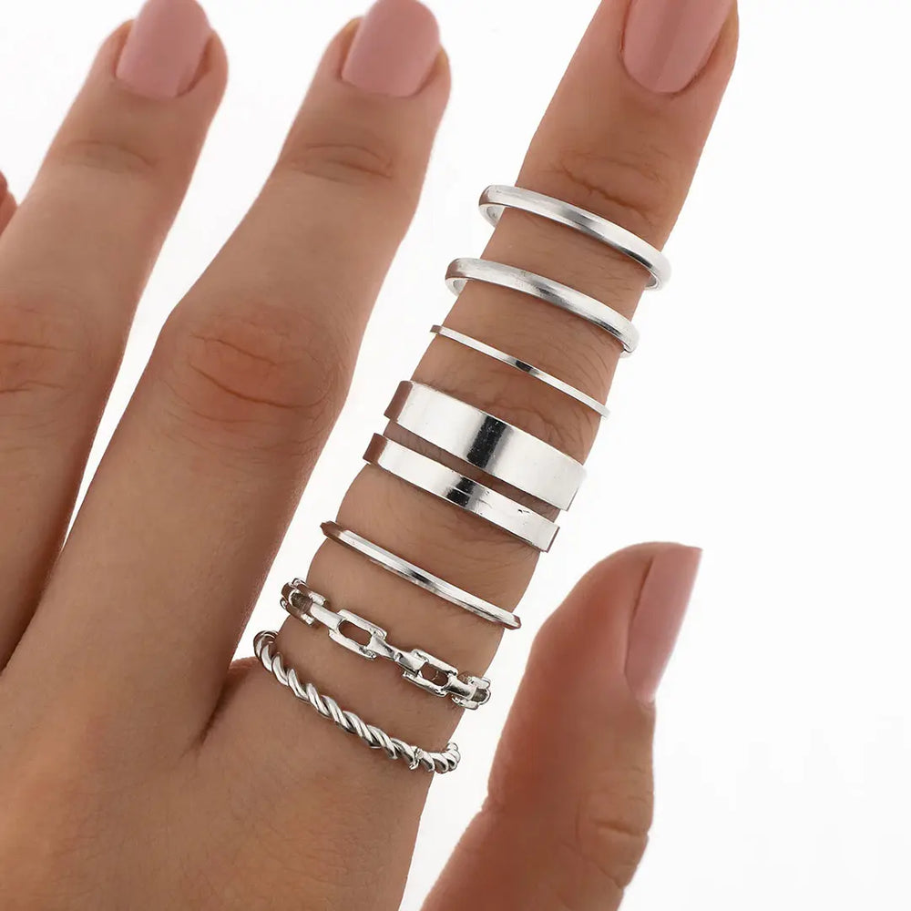 Set plateado bijou 7 anillos