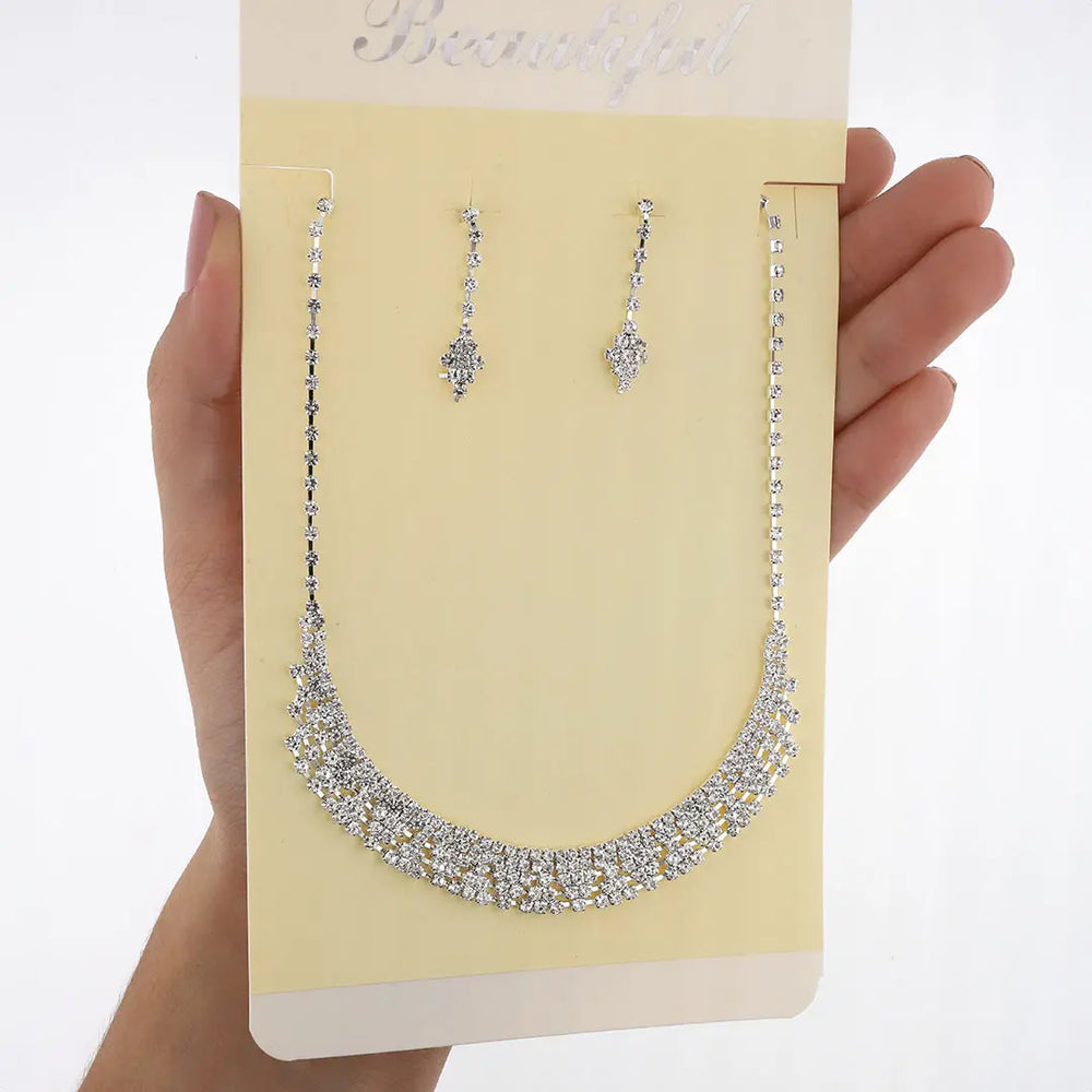 Set plateado bijou colgante + aros