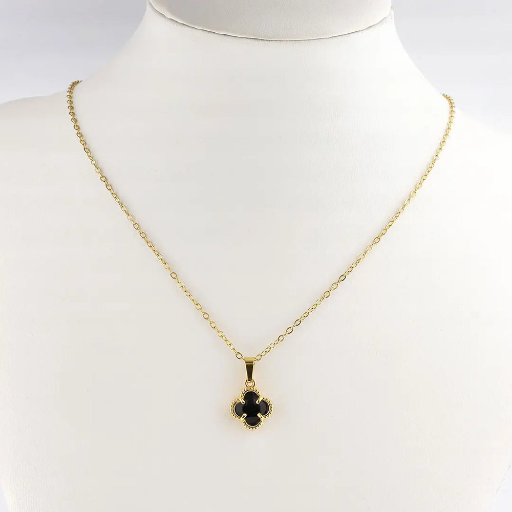 Colgante trebol negro acero dorado