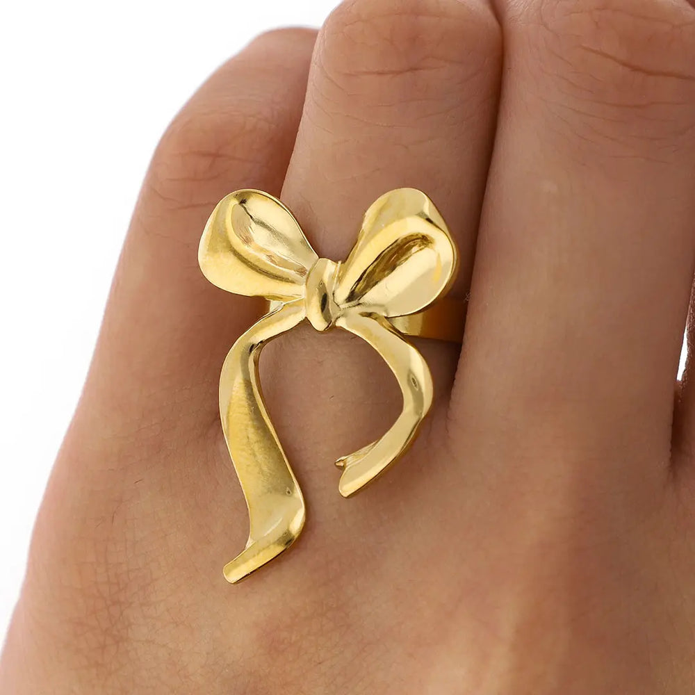 Anillo moño acero dorado