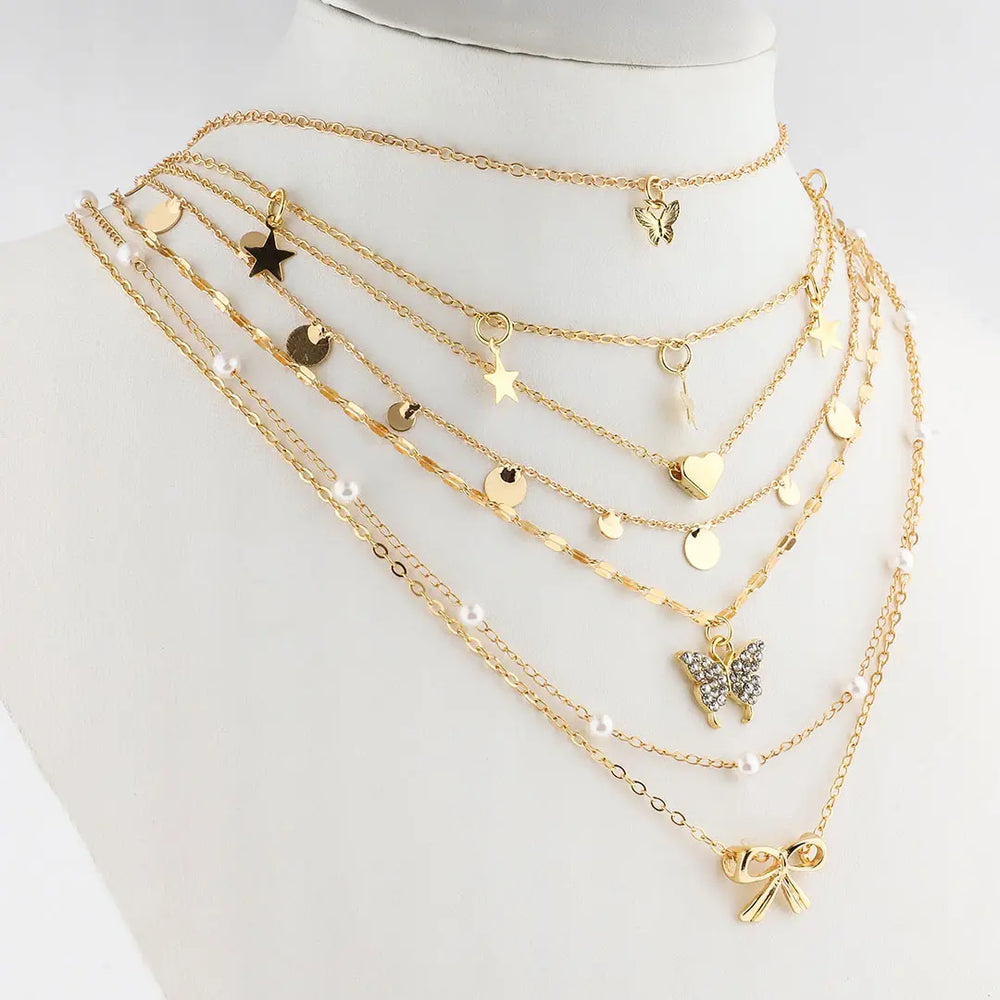 Set dorado bijou 7 colgantes