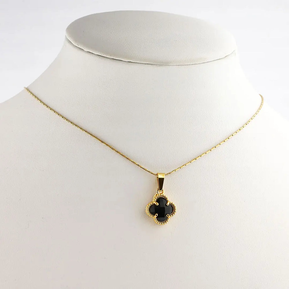 Colgante trebol acero dorado