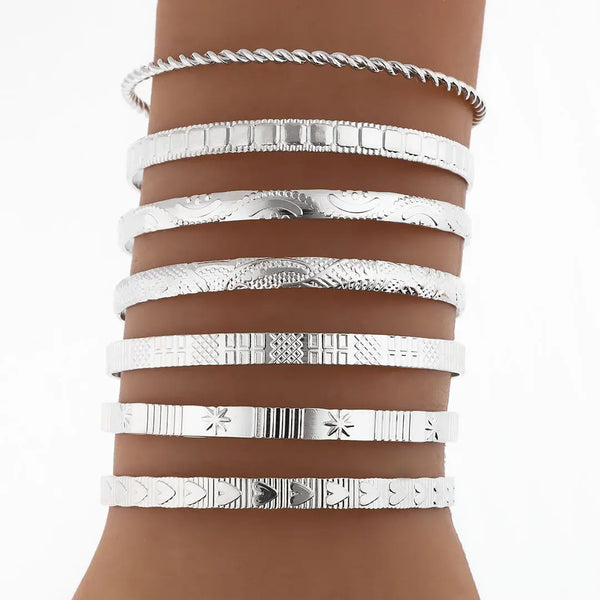 Set plateado bijou 7 brazaletes