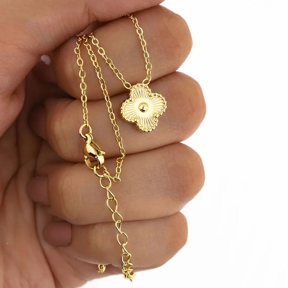 Colgante Cleff acero dorado