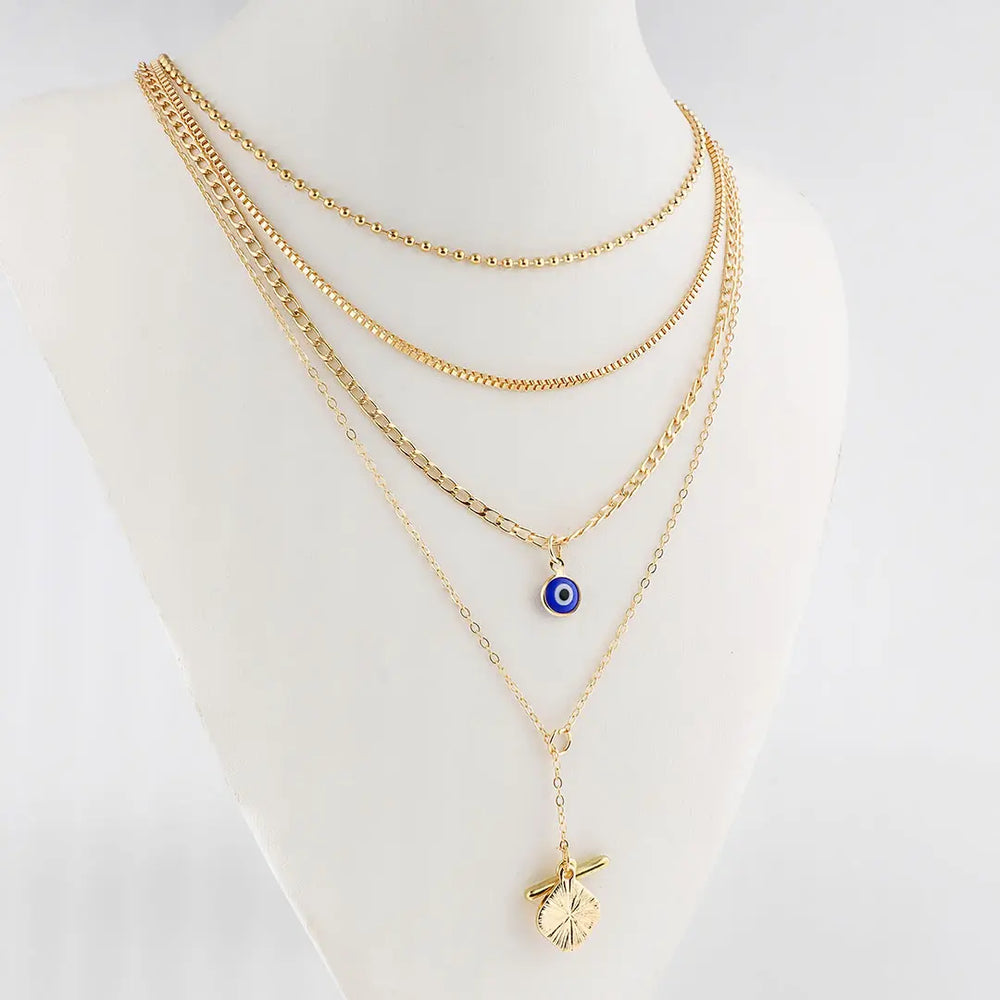 Set dorado bijou 4 en 1 colgante