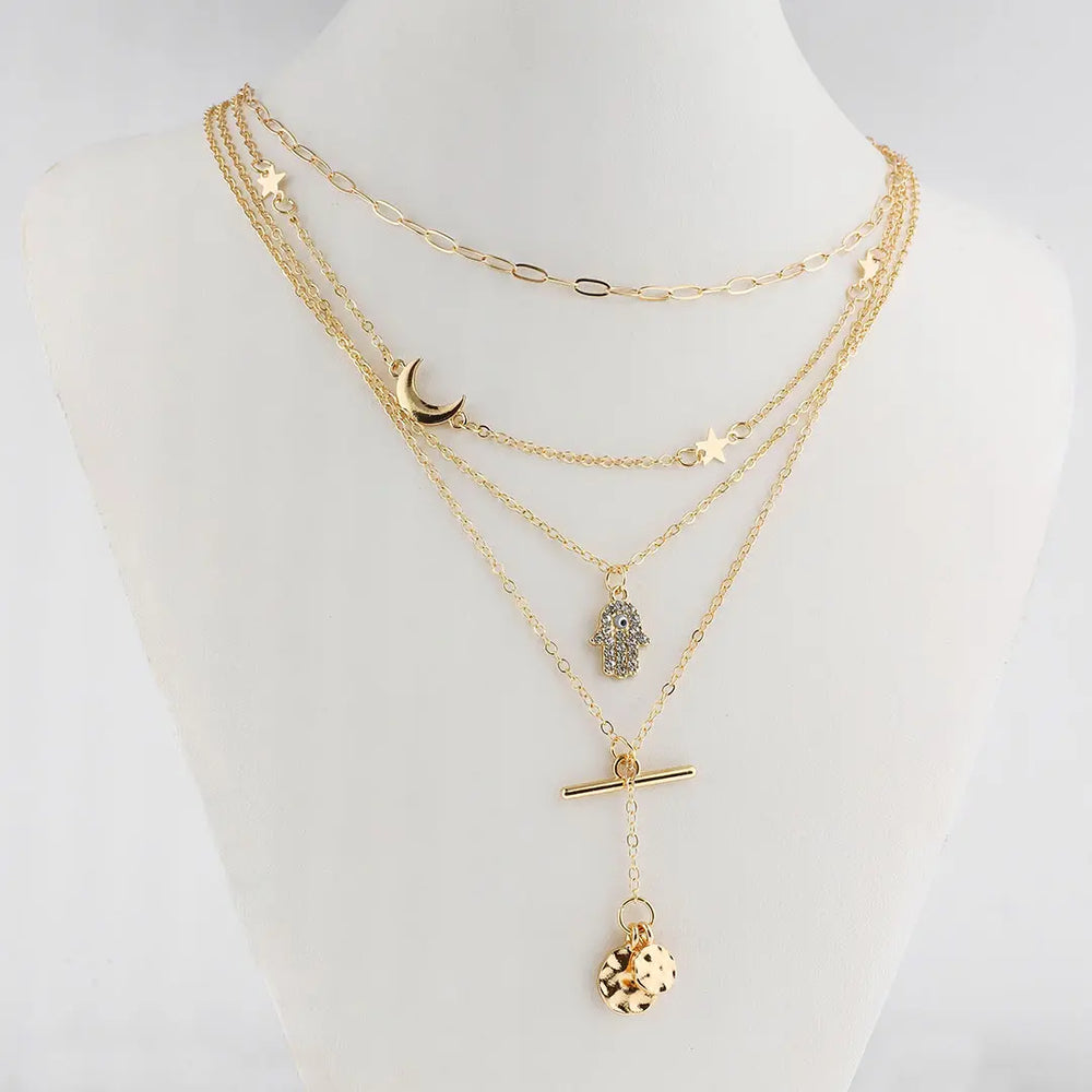 Set dorado bijou 4 en 1 colgante