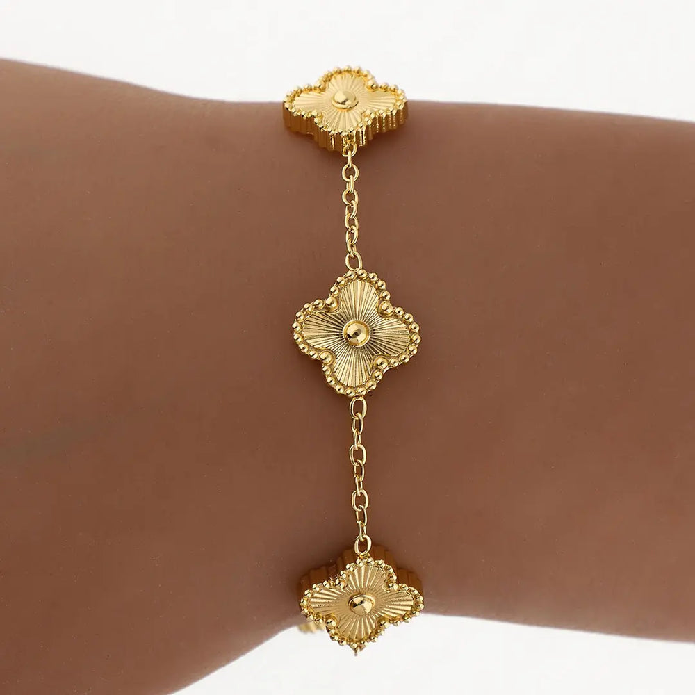 Pulsera Cleff acero dorado