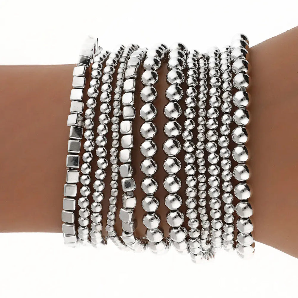 Set plateado bijou 12 pulseras