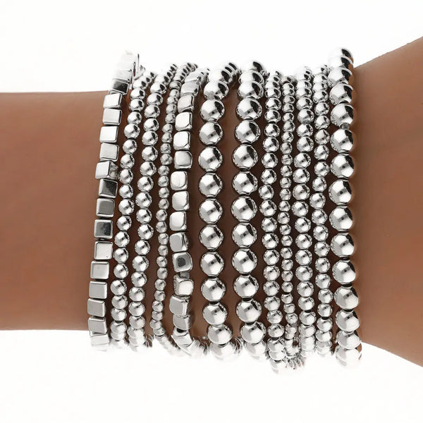 Set plateado bijou 12 pulseras