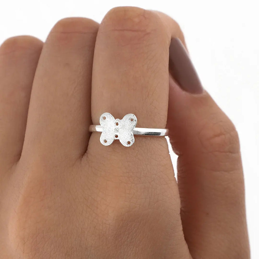Anillo mariposa regulable plating