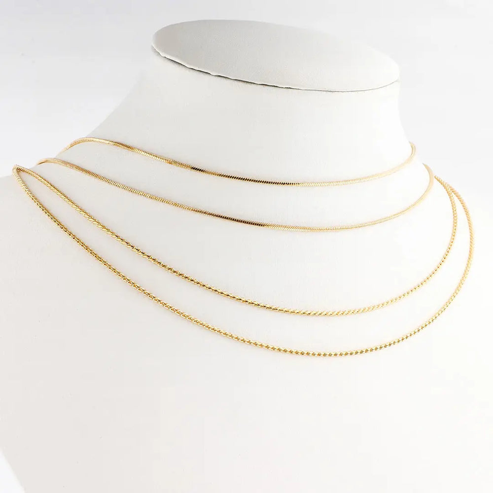 Set dorado bijou 2 colgantes